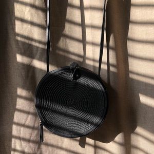 Express Black Round Woven Crossbody Bag